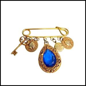 Vintage Gold Tone Blue Teardrop Glass Safety Pin Brooch with Key and Coin Charms